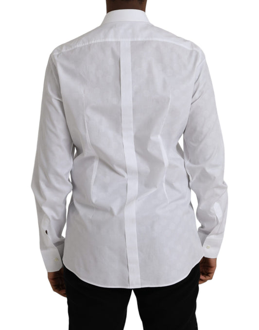 A white polka dotted cotton dress shirt with a gold collar and cuffs