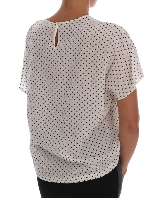 White blouse with polka dots on back