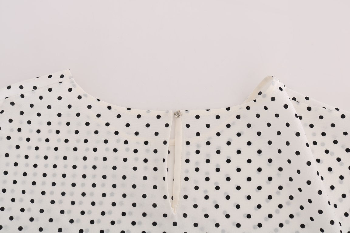 White fabric with black polka dots
