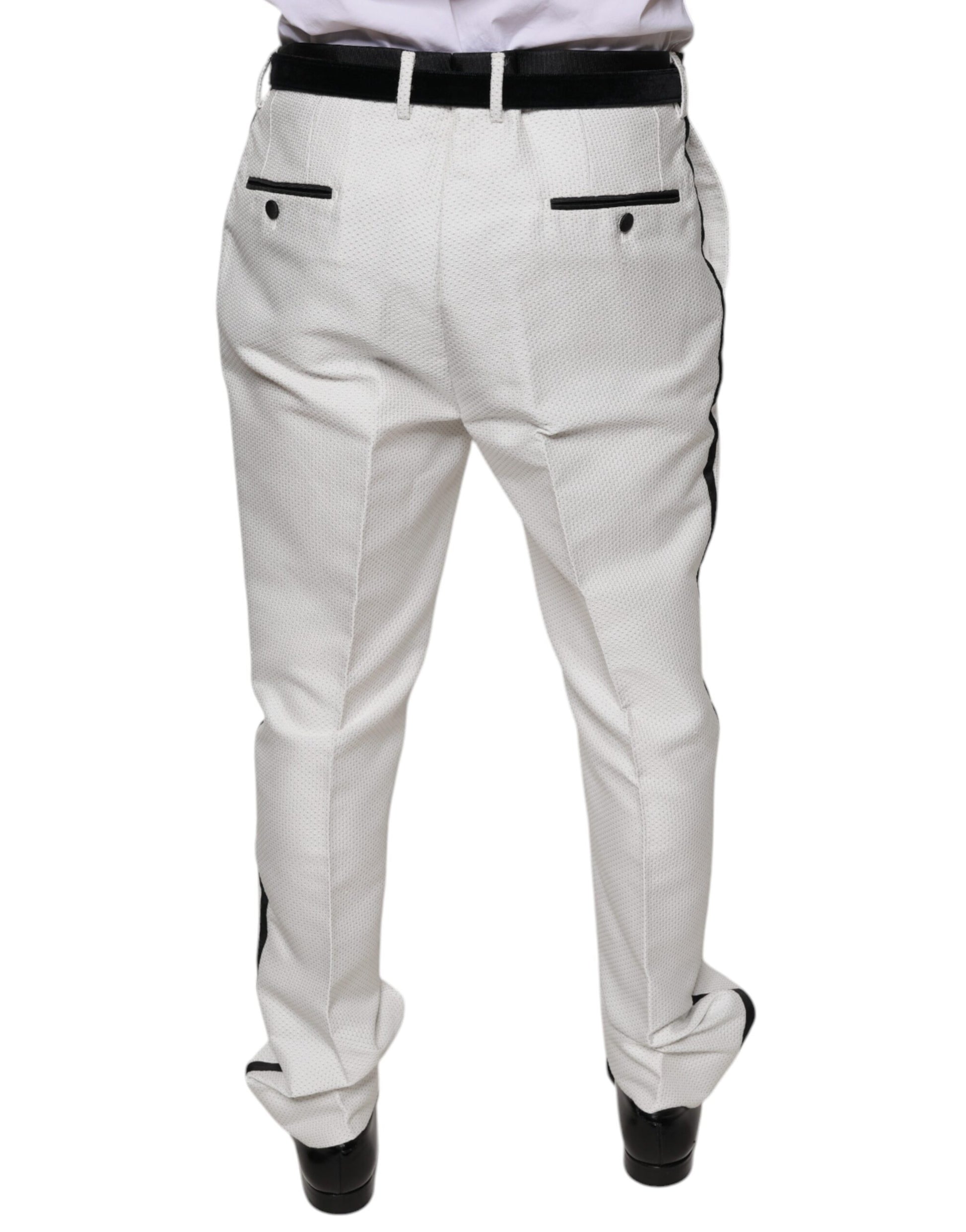 A pair of white polyester formal dress pants with a textured pattern and black belt loops
