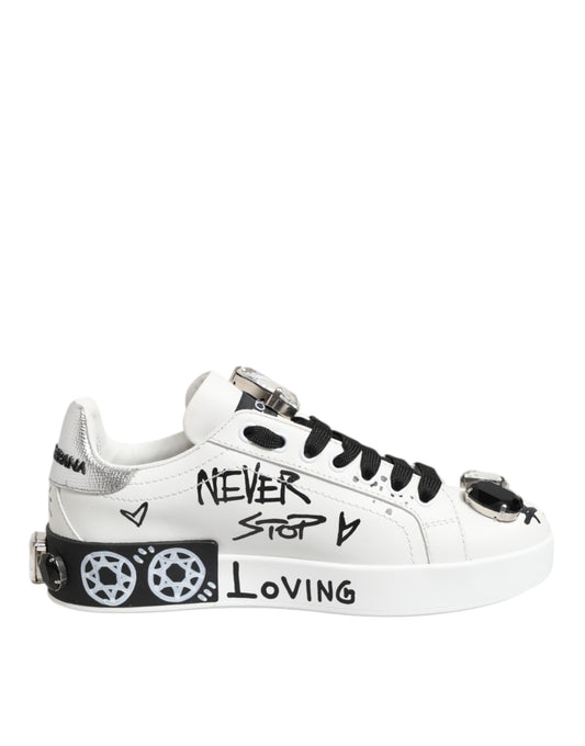 White sneakers with black laces, featuring a graphic design on the side and text reading "NEVER STOP LOVING"