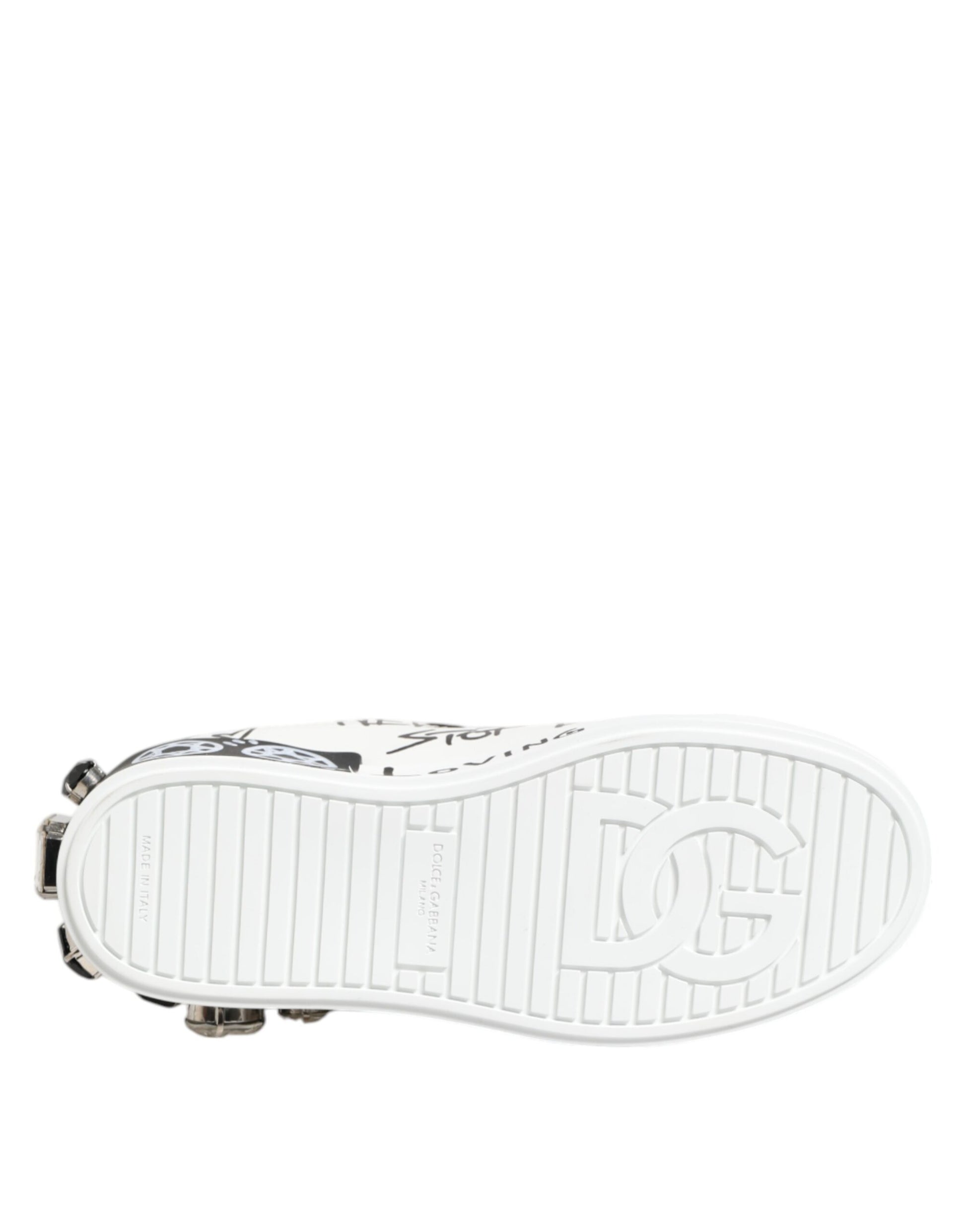 A single white sneaker with a crystal embellishment on the toe and heel