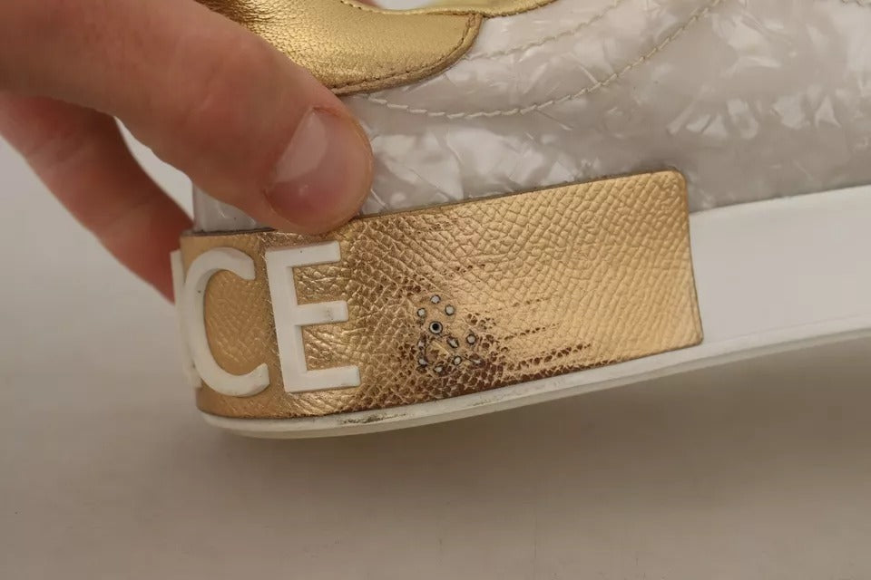 Gold-embossed sneaker with white base, featuring a mother of pearl design