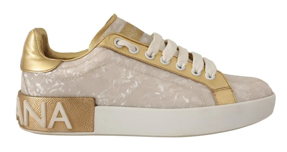 Gold accents on white sneakers with mother of pearl detailing