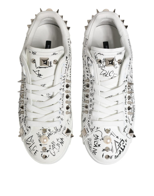 Pair of white sneakers with studs, autographed by various celebrities