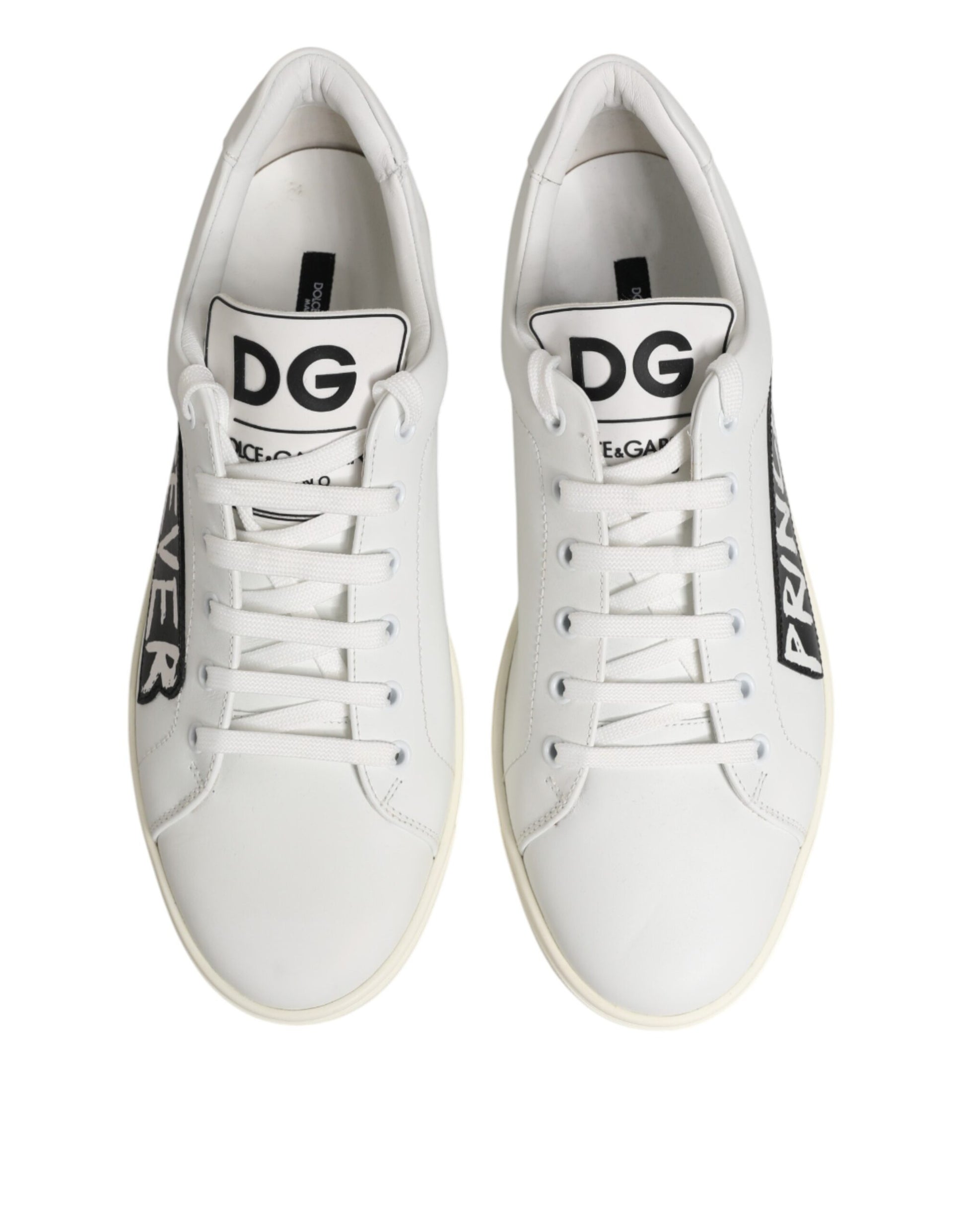 Pair of white sneakers with black laces and brand logo on side