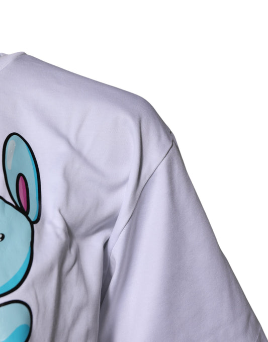 White t-shirt with blue cartoon character on front