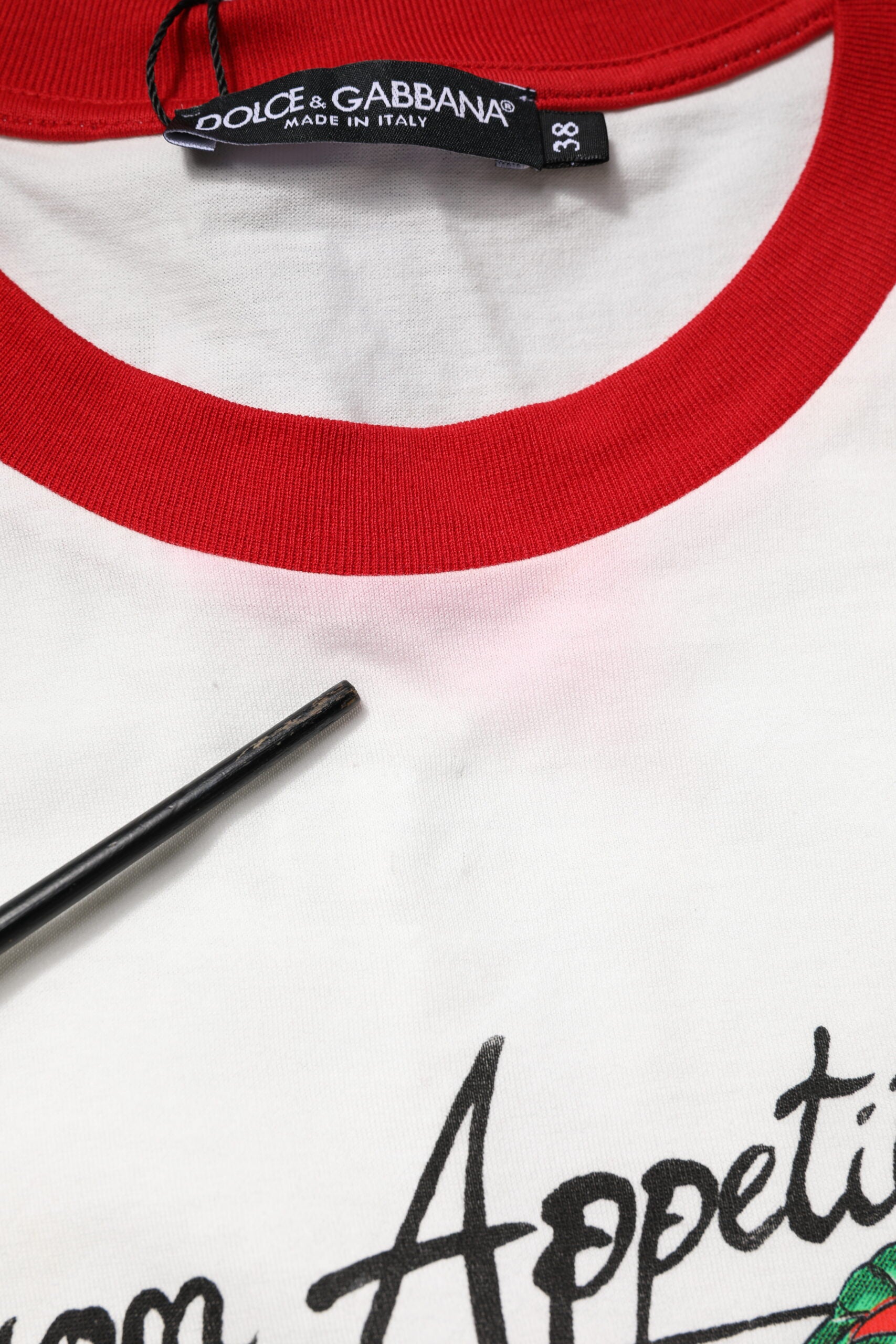 Red and white t-shirt with logo on front