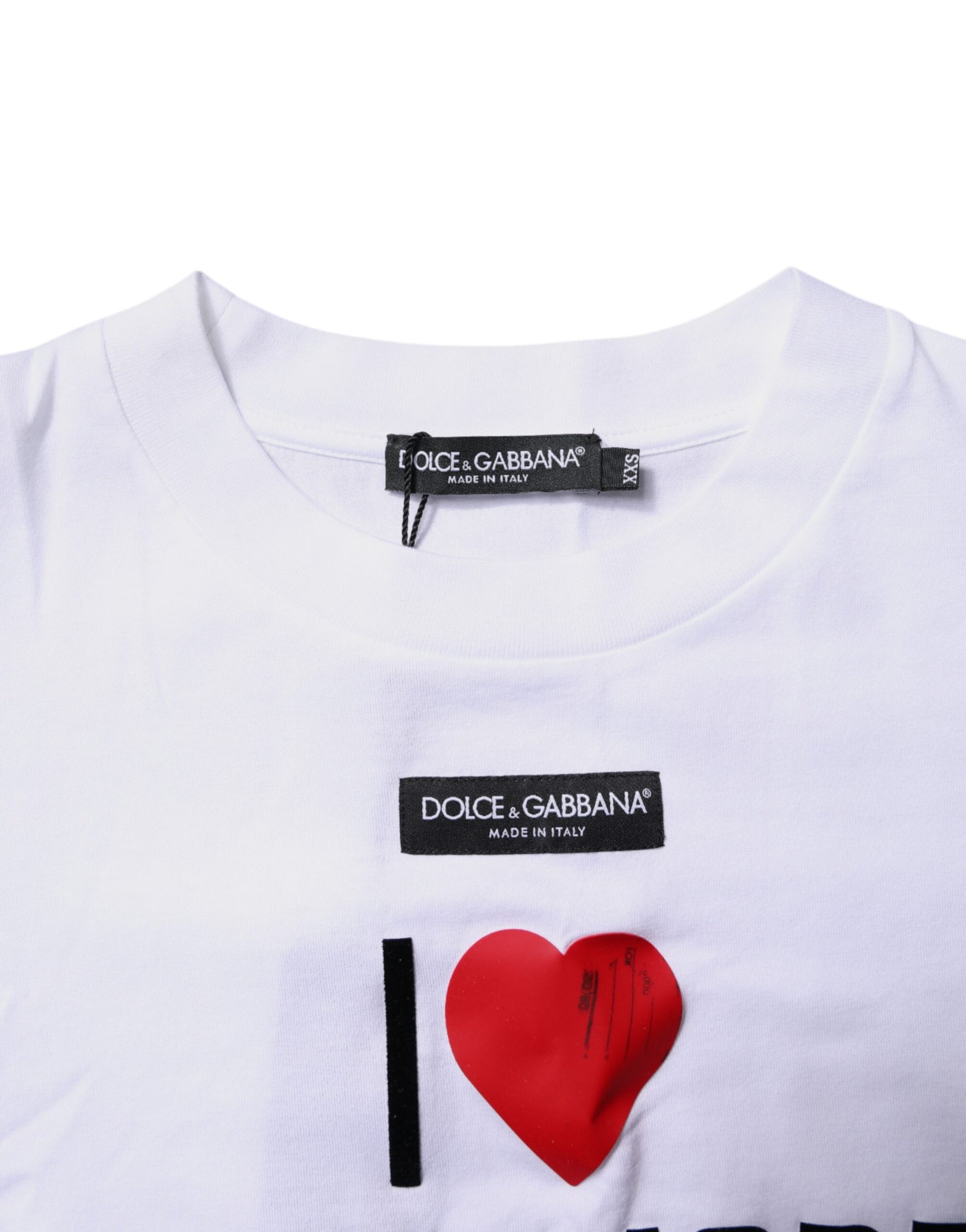 White t-shirt with red heart graphic