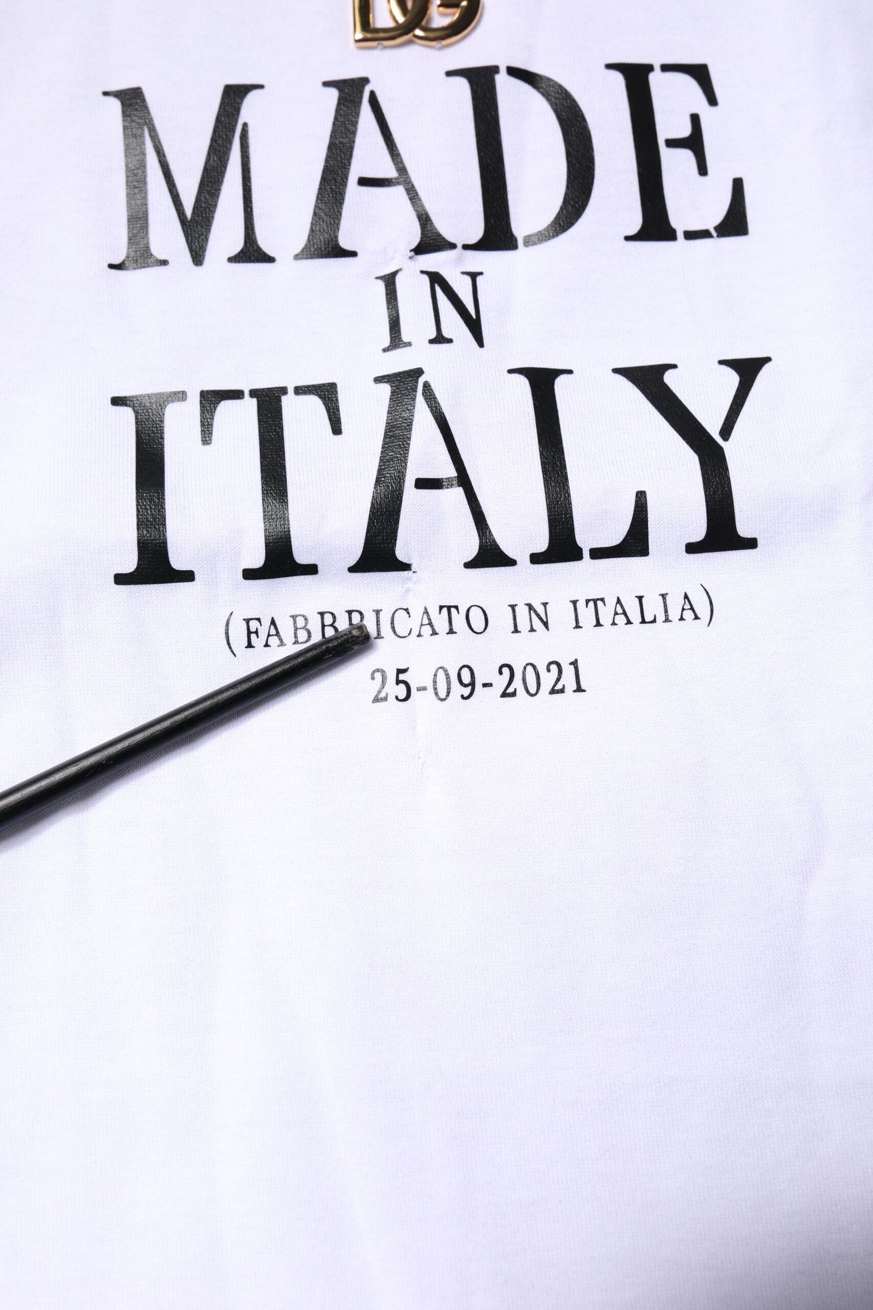 White t-shirt with black lettering