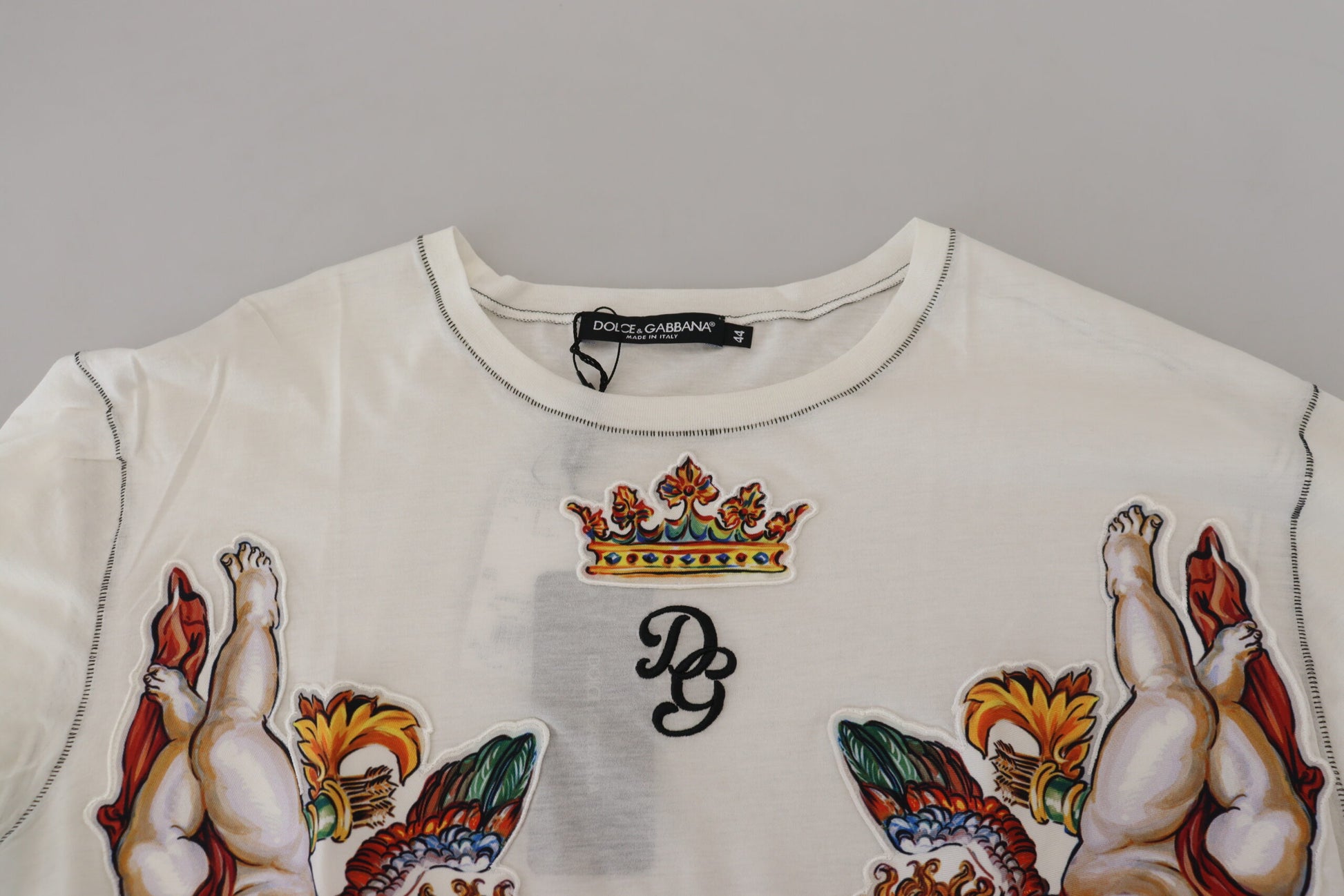 White shirt with embroidered design on front