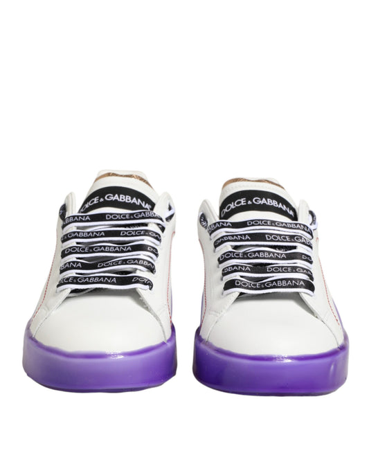 Pair of white and purple leather sneakers with black laces, branded logo on side