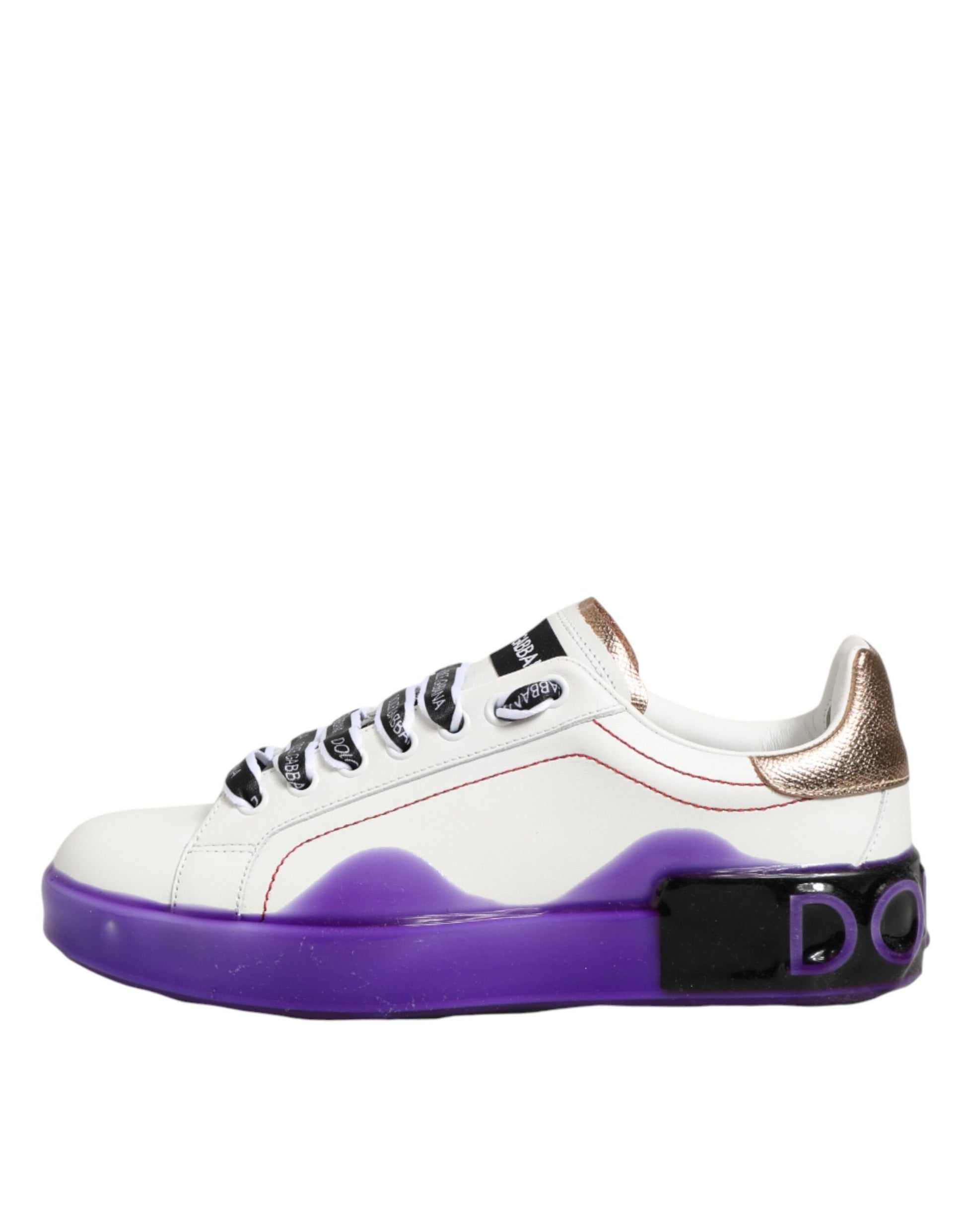 A pair of white and purple leather sneakers with gold accents, featuring a low top design
