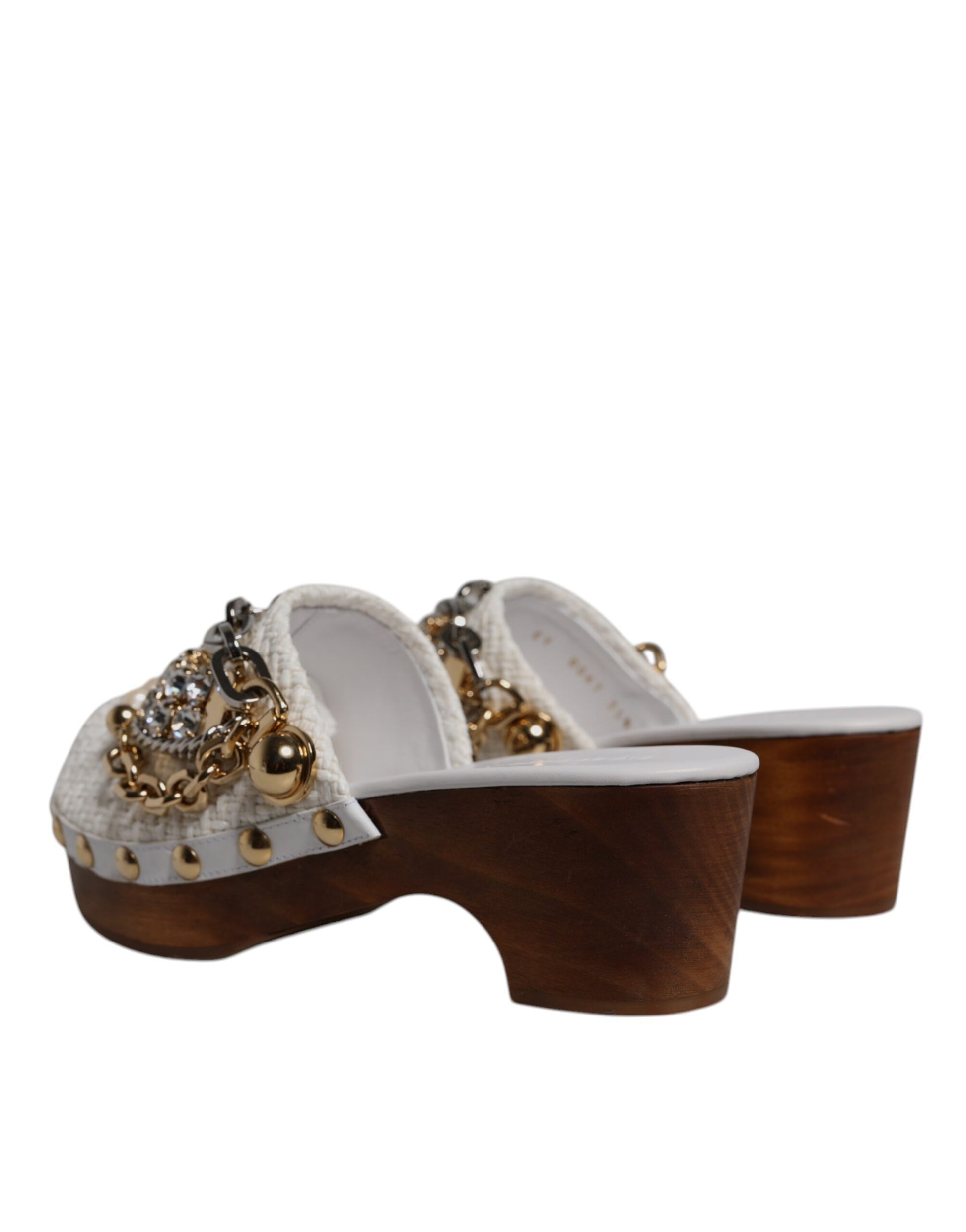 Pair of women's sandals with embellishments on top