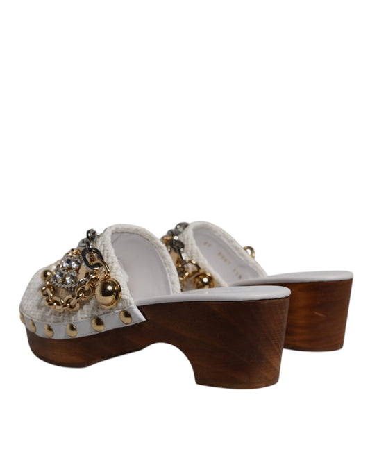 Pair of women's sandals with embellishments on top