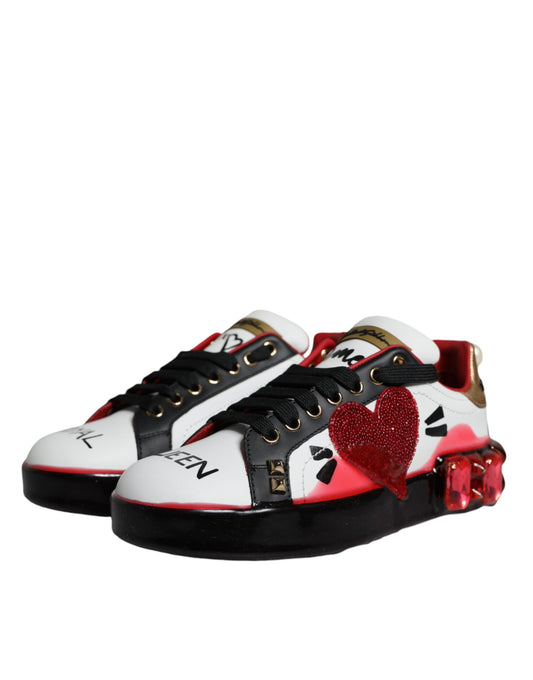 Pair of high top sneakers with red and black design featuring a heart pattern on side