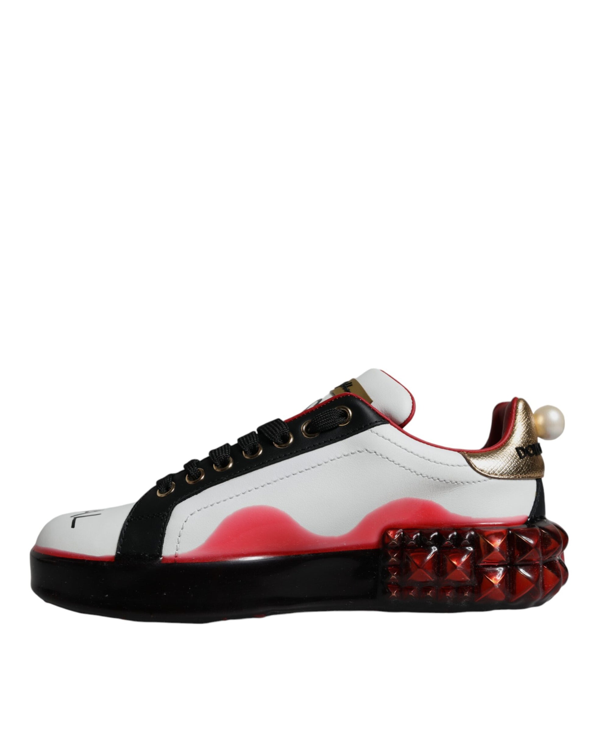 Pink and white sneaker with red accents, gold laces, and spiky heels