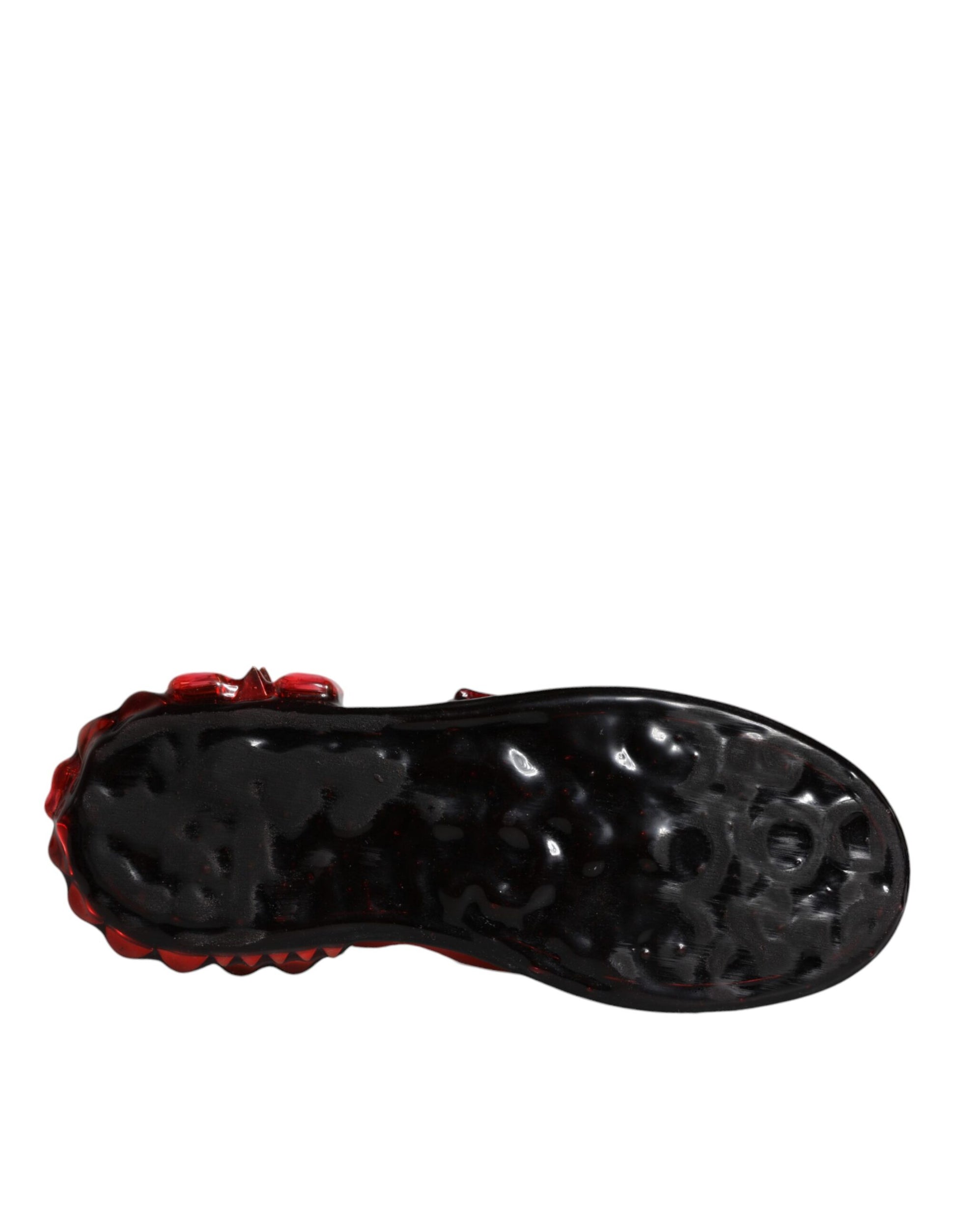 Black shoe with red sole