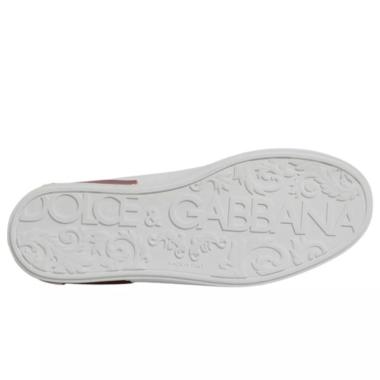 A white sneaker with red accents, featuring a logo on the side and a design on the sole