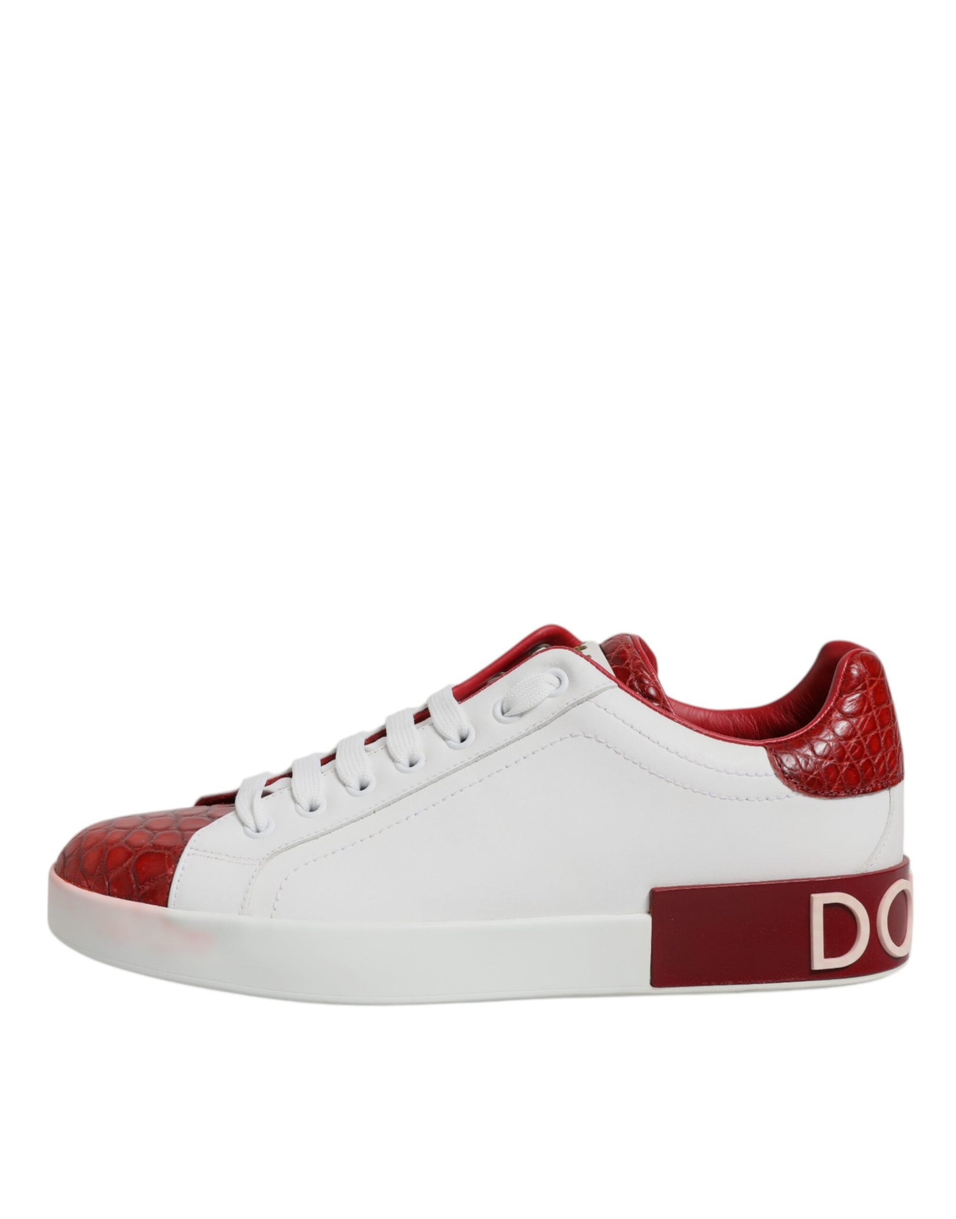 A pair of white red leather men's sneakers with a brand logo on the side