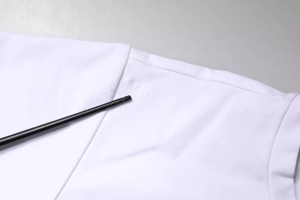 Black pen on white lab coat