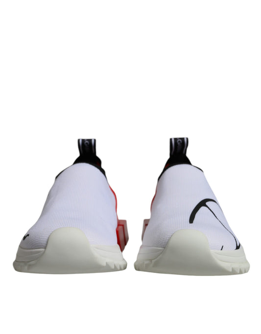 Pair of white, red, and black sneakers with a low top design