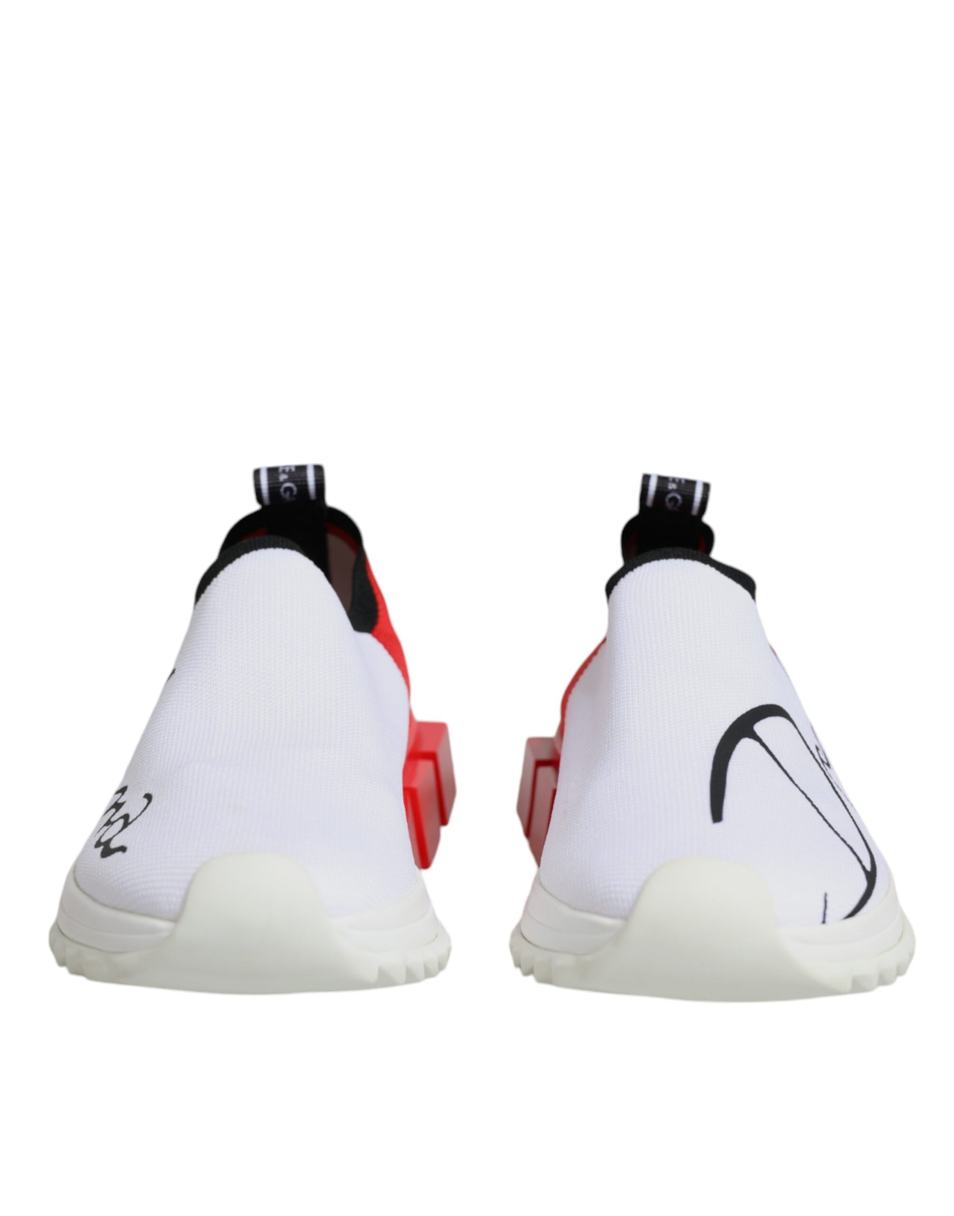 Pair of white and red sneakers with black laces, featuring a low top design