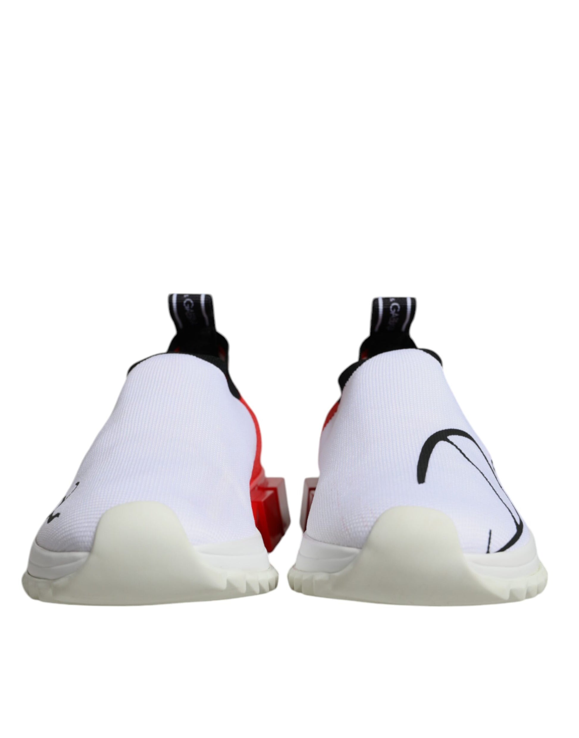Pair of white, red, and black sneakers with laces