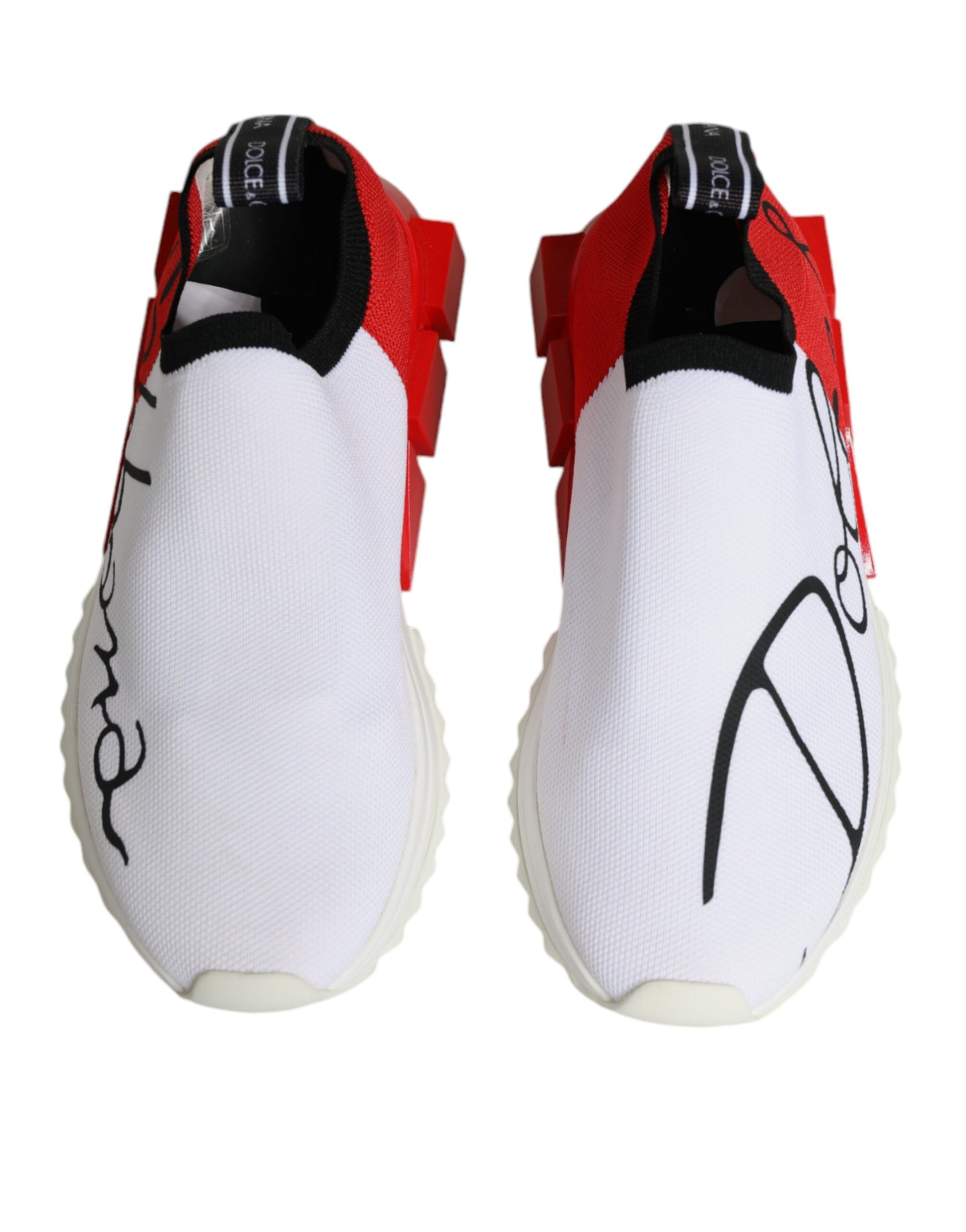 Pair of white, red, and black sneakers with a low top design