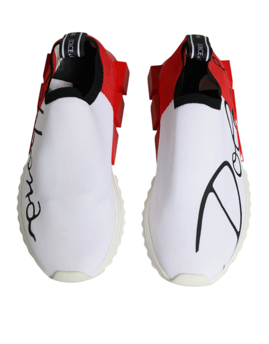 Pair of white, red, and black sneakers with a low top design