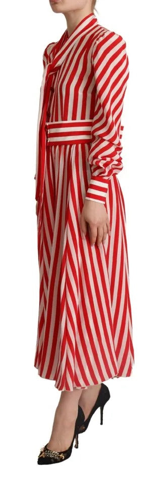 Long red and white silk dress with A-line skirt, worn by model