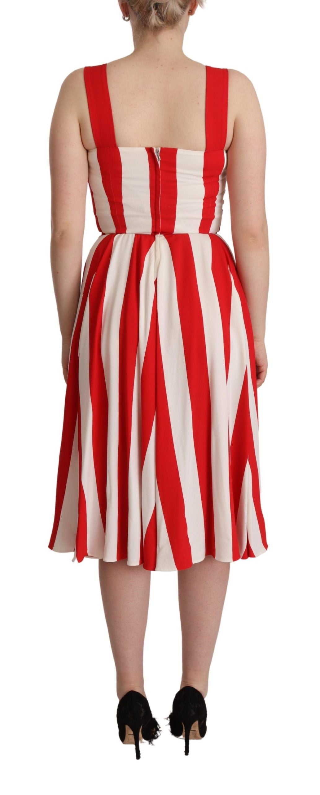 A red and white striped dress with short sleeves, designed by Dolce & Gabbana. It features an A-line silhouet
