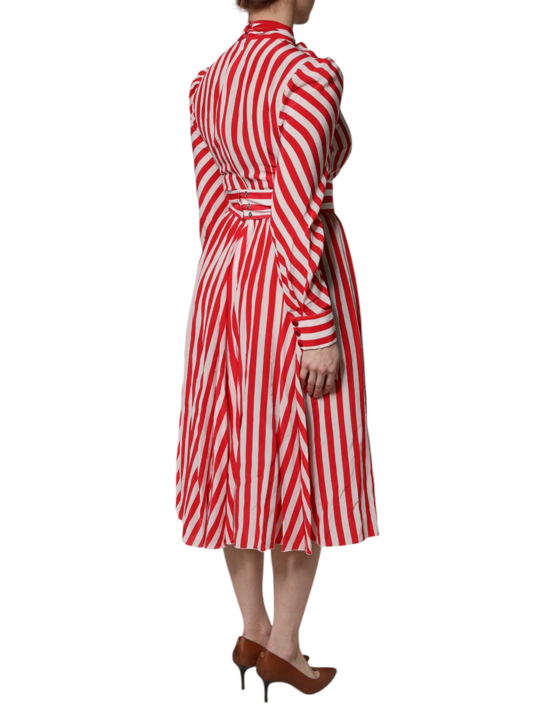 A long sleeve midi dress with red and white stripe pattern