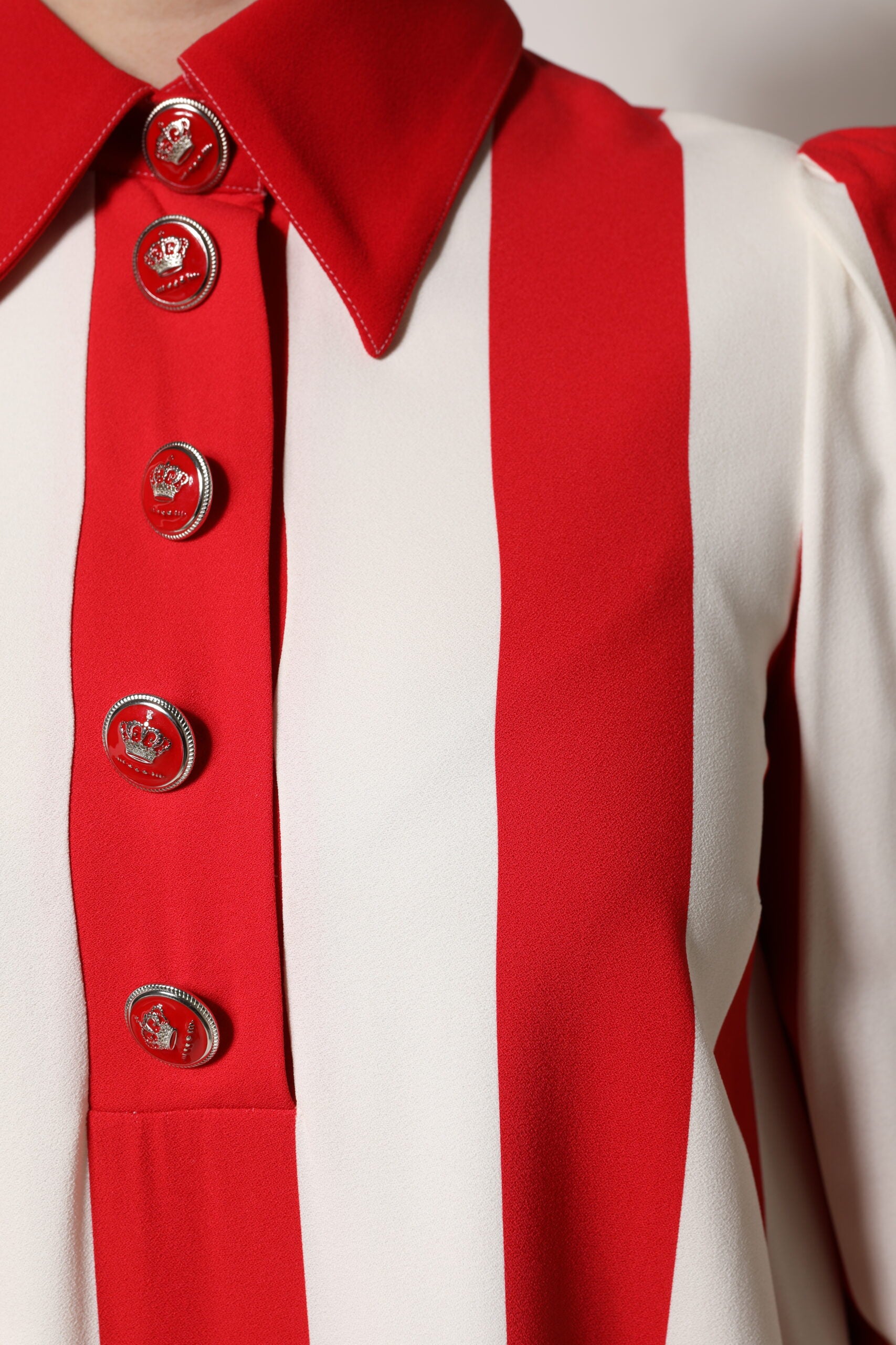 A red and white striped dress with buttons down front