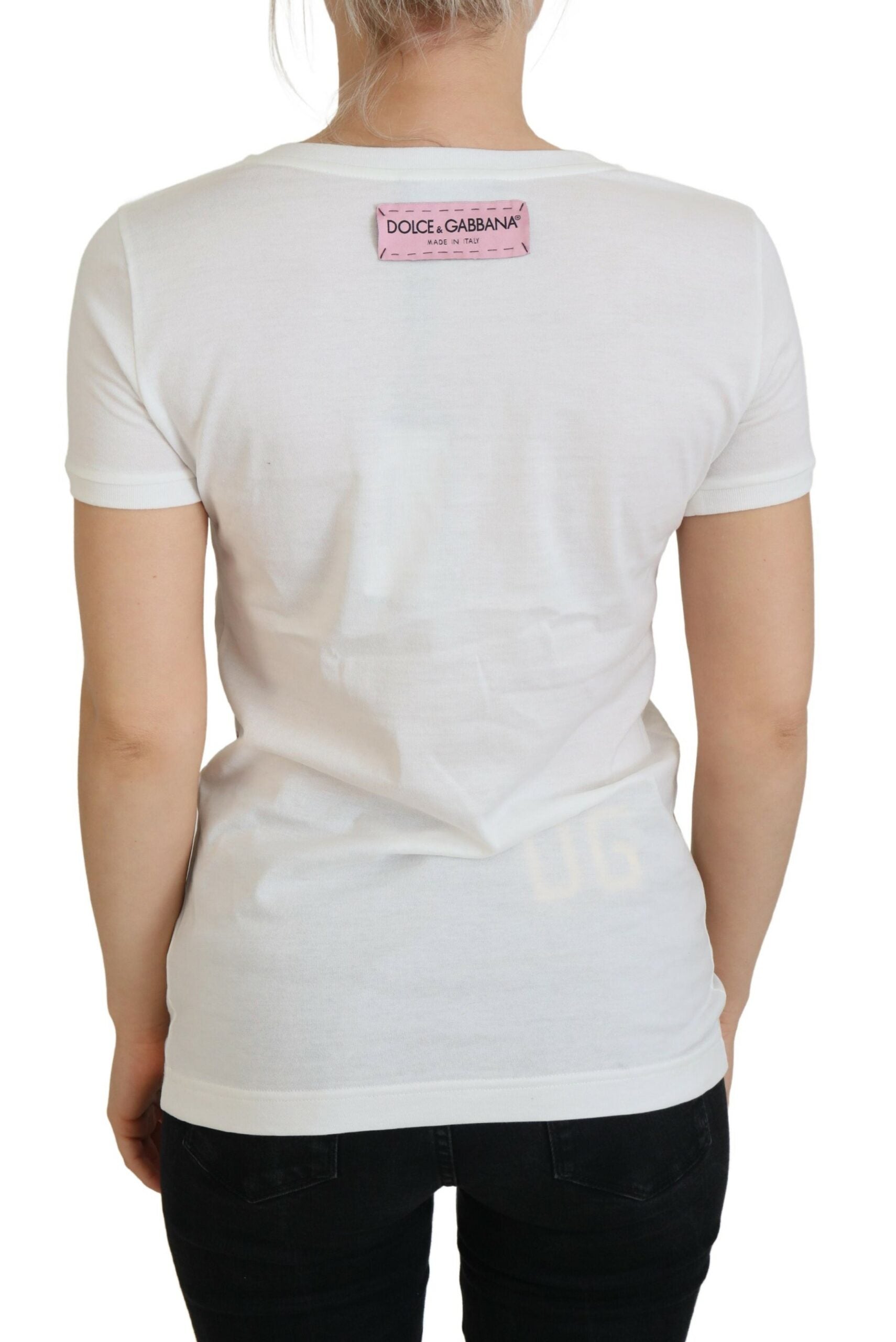 White t-shirt with pink label on back