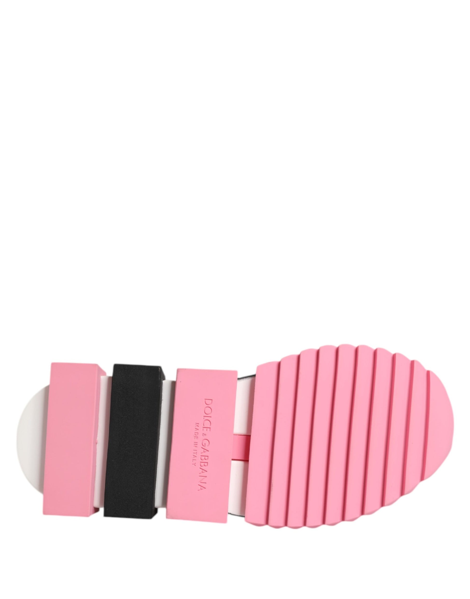 Pink shoe with pink sole and black straps