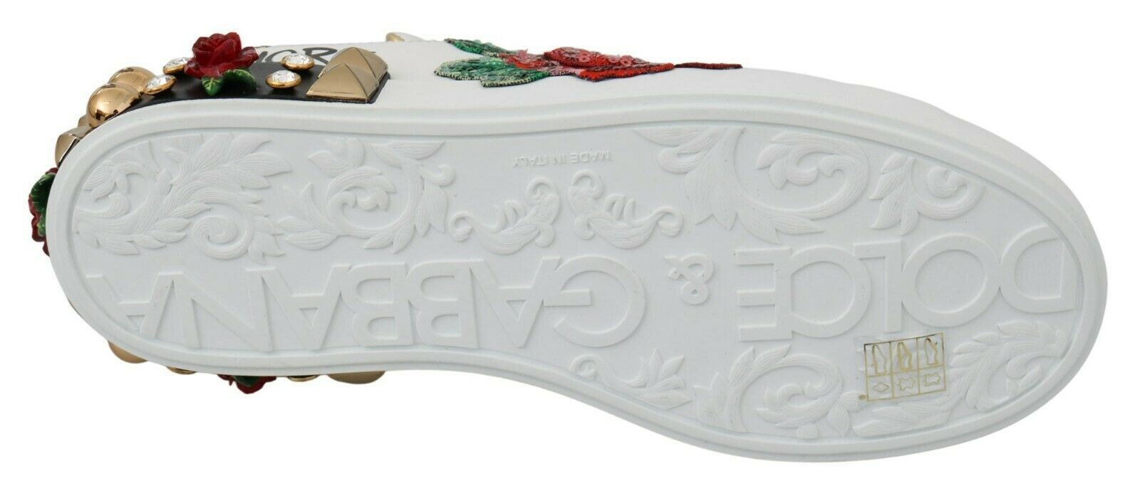 White shoe with red and green embroidery on top