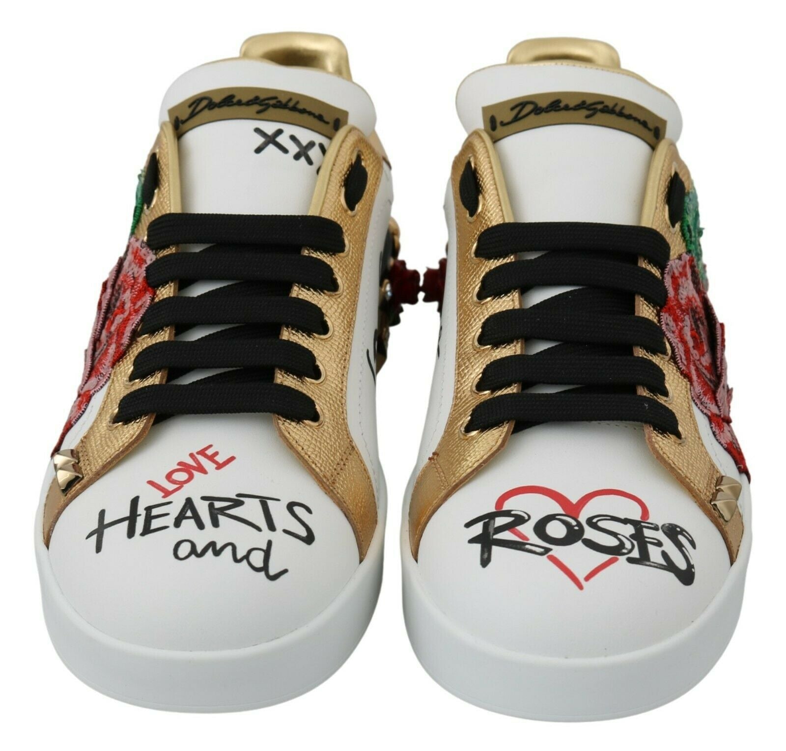 Pair of sneakers with handwritten messages on side