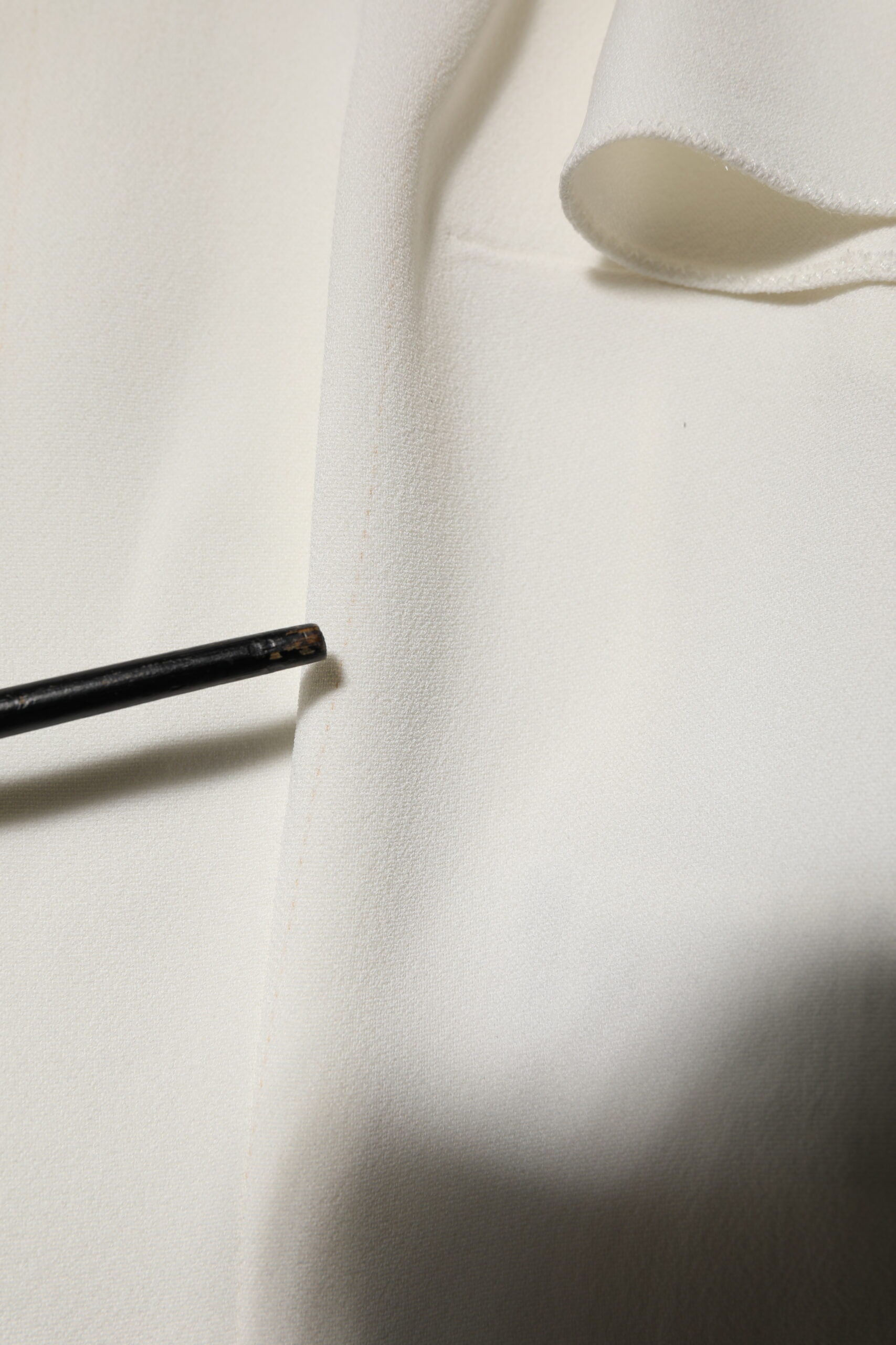 White cloth with black marking pen