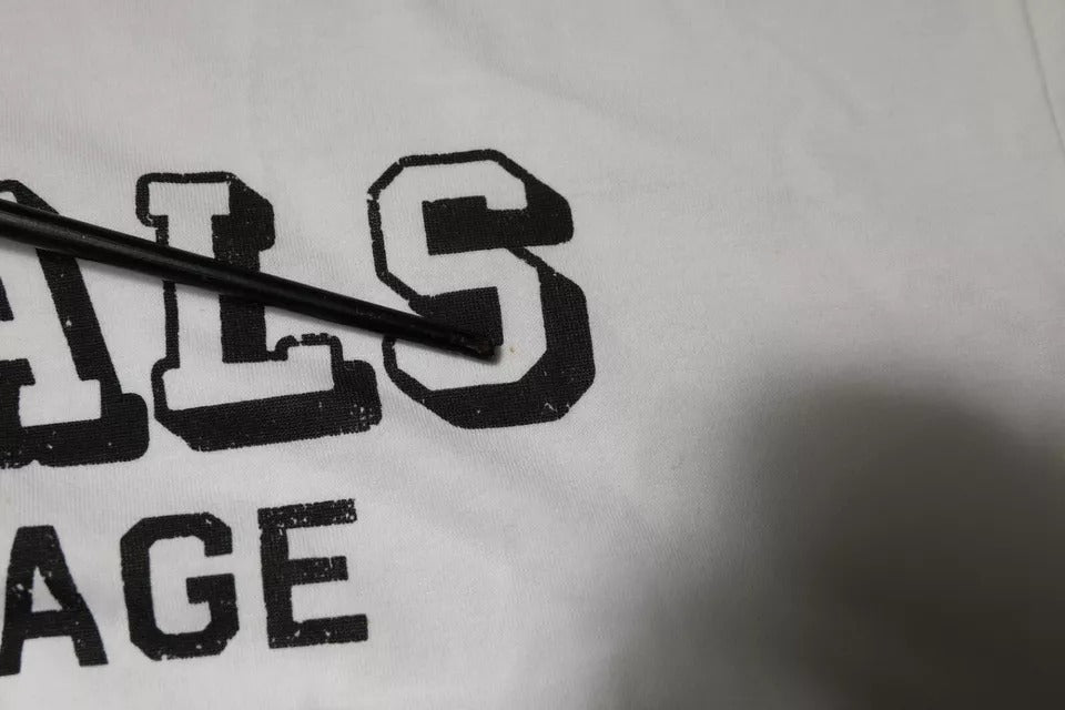 White t-shirt with black lettering