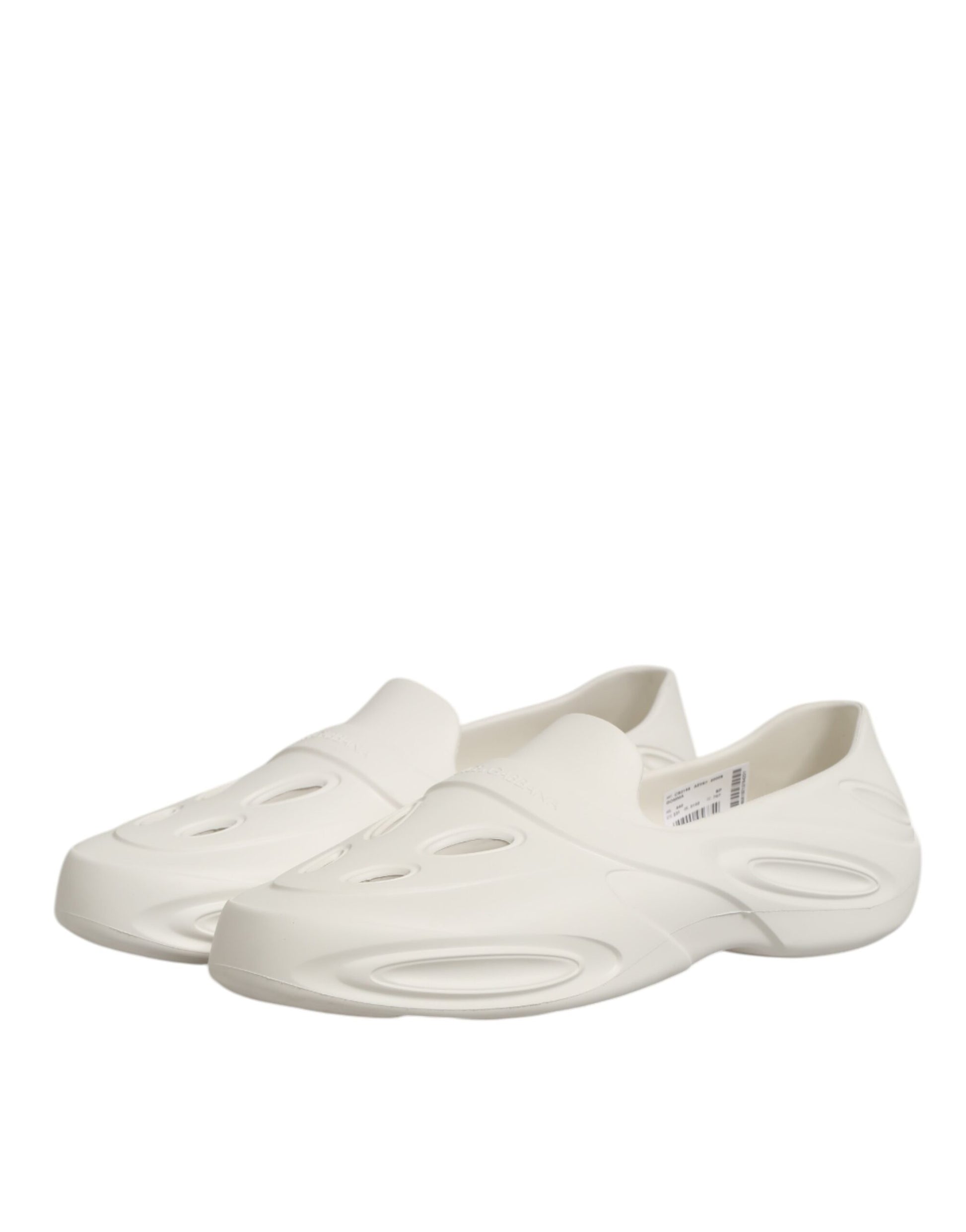White sandals with holes for feet