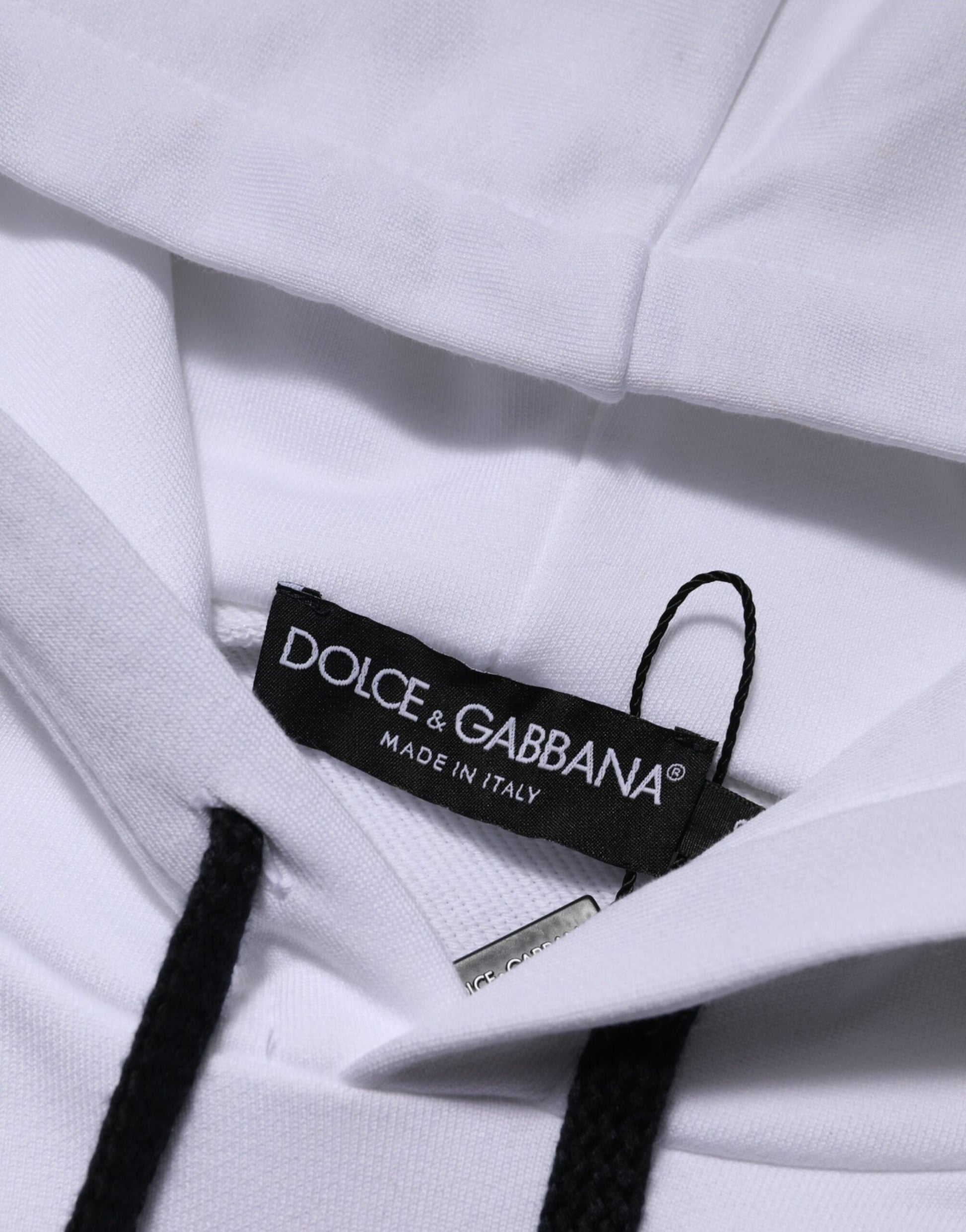 White hoodie with black label on front