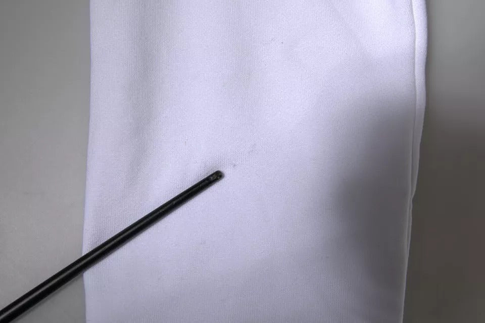 Black chopsticks on white napkin