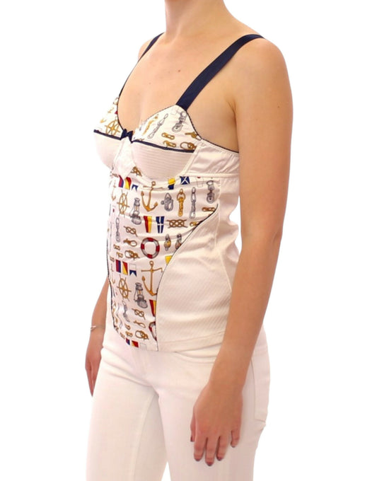Woman wearing a sleeveless top with a patterned design on the front