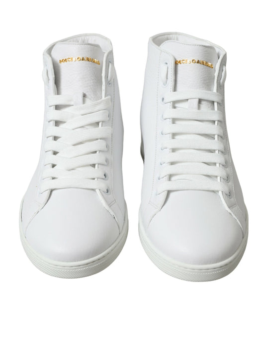 Pair of white sneakers with laces and a small logo on the side