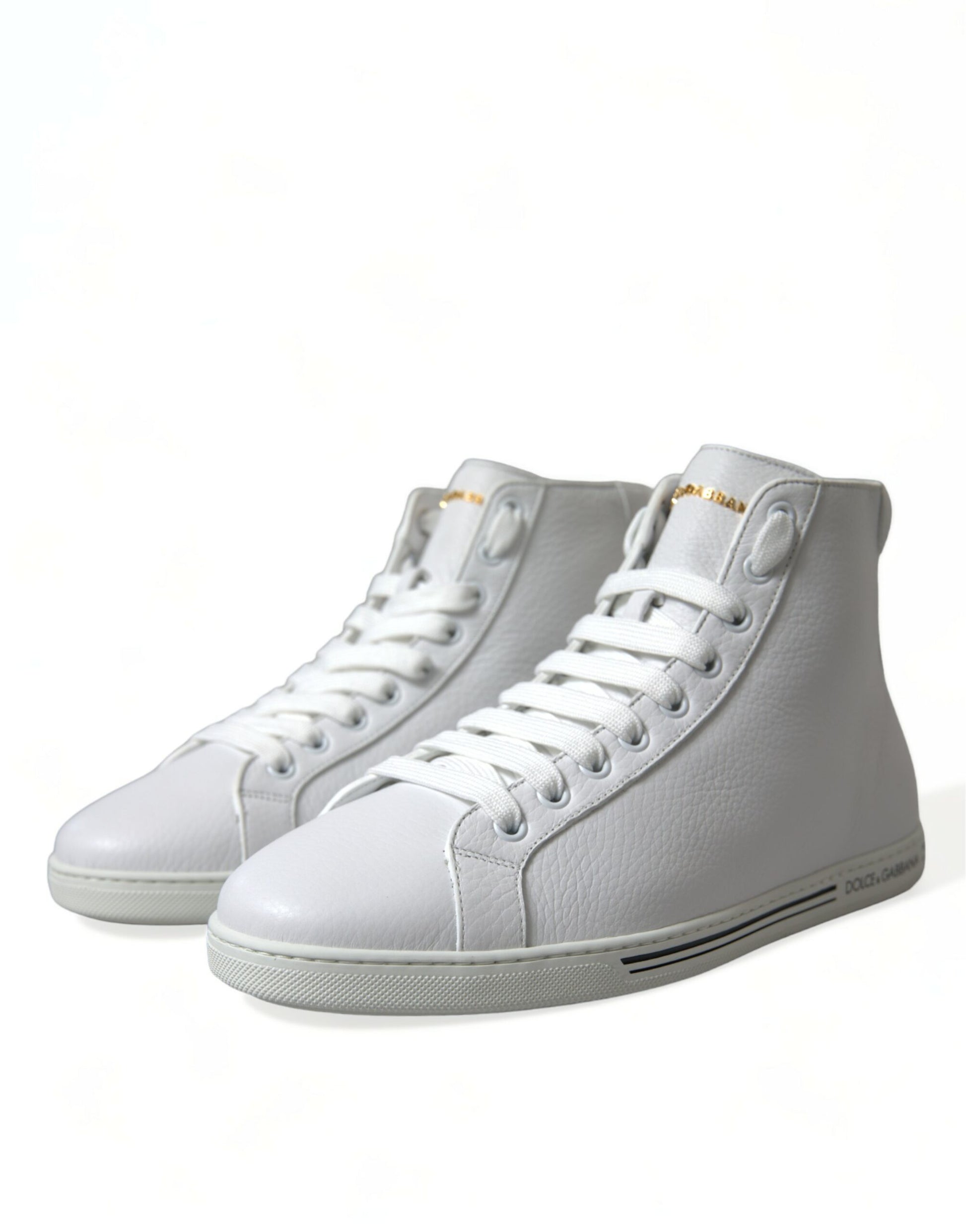 Pair of gray sneakers with white soles and laces