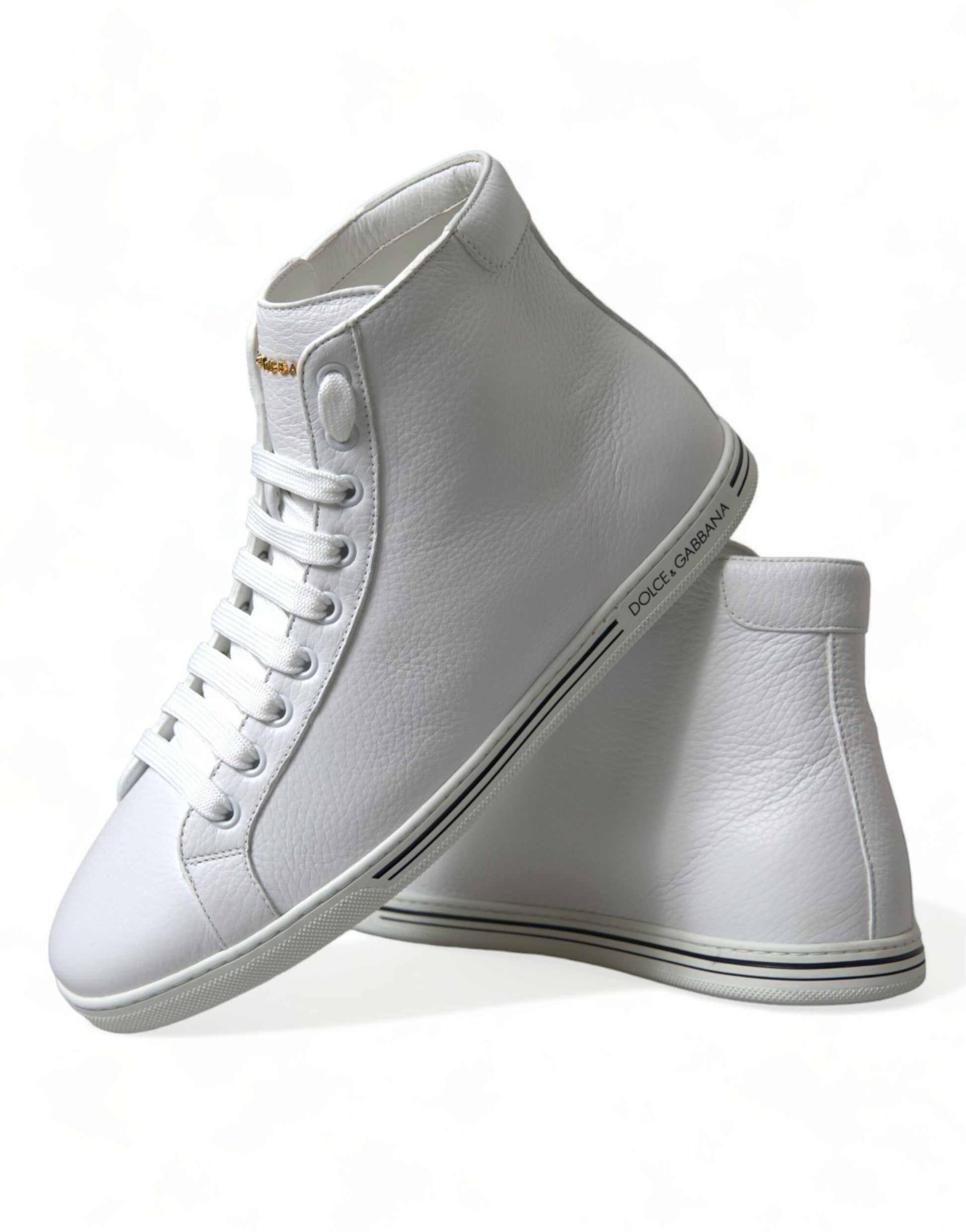 Pair of white sneakers with laces and a small logo on the side
