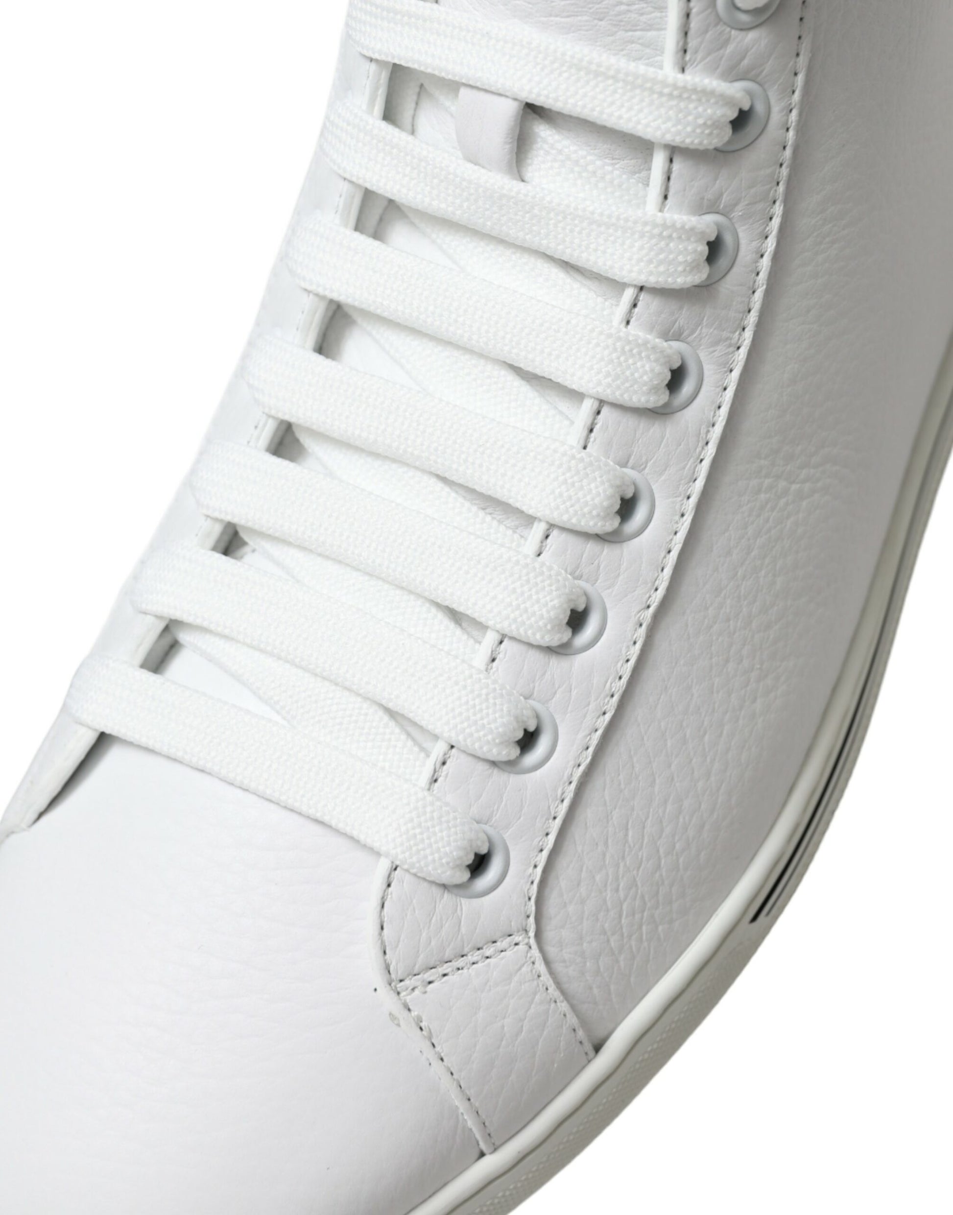 White sneaker with white laces and a white sole