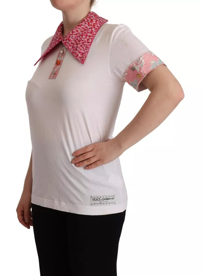 Woman wearing white t-shirt with pink collar and sleeves