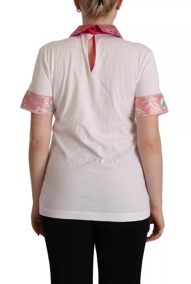 Woman wearing a white shirt with pink and blue patterned sleeves
